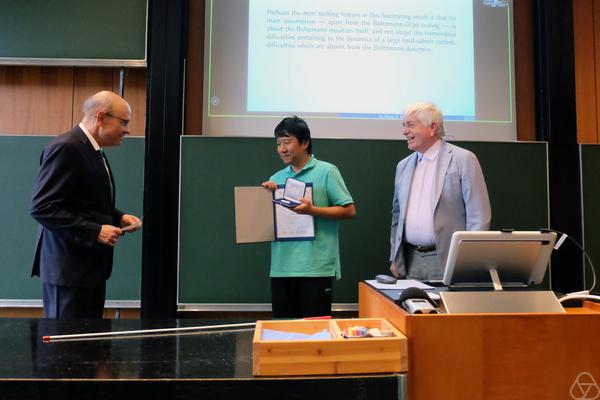 Thomas Peternell, Yu Deng, Gerhard Huisken